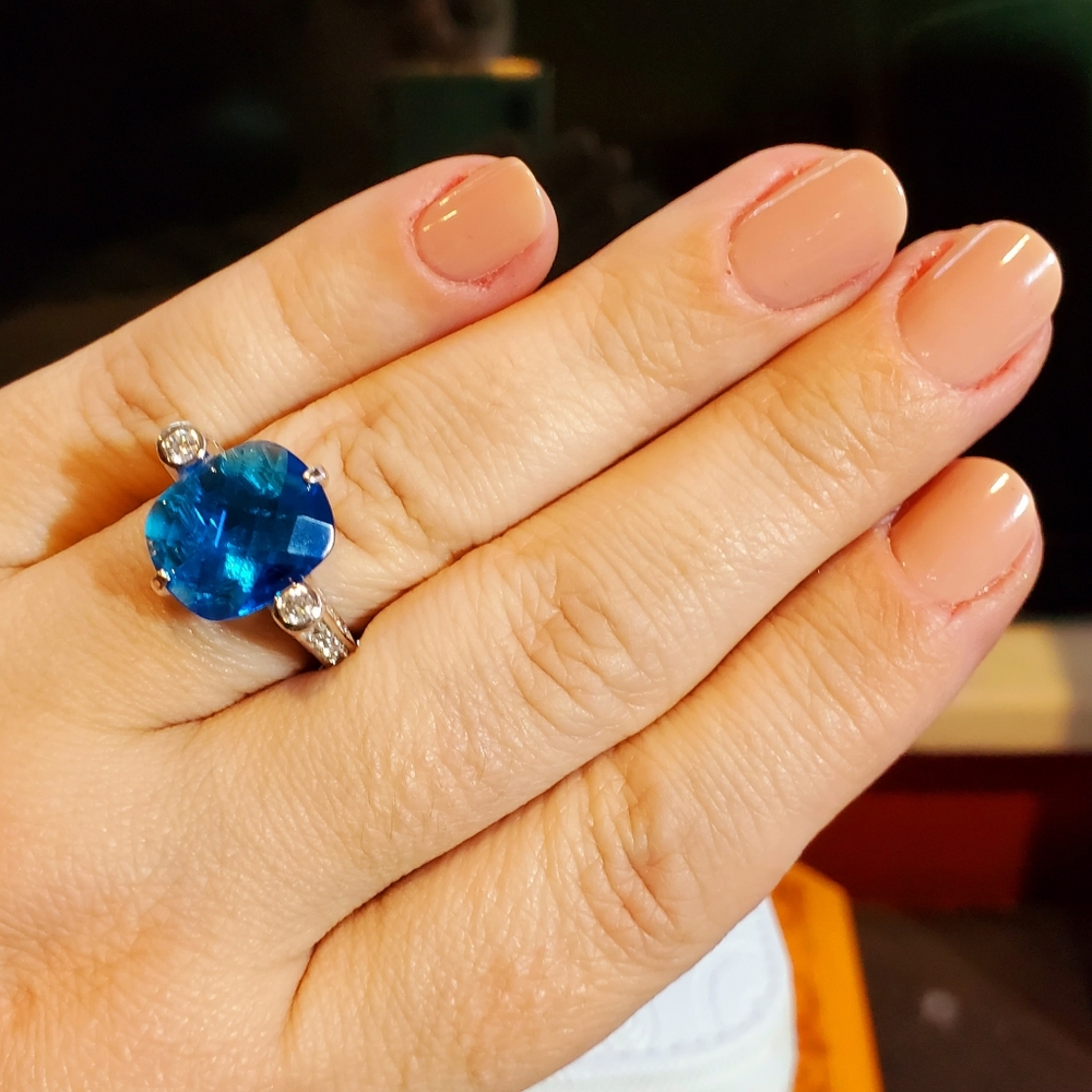 Sterling silver ornate blue stone ring